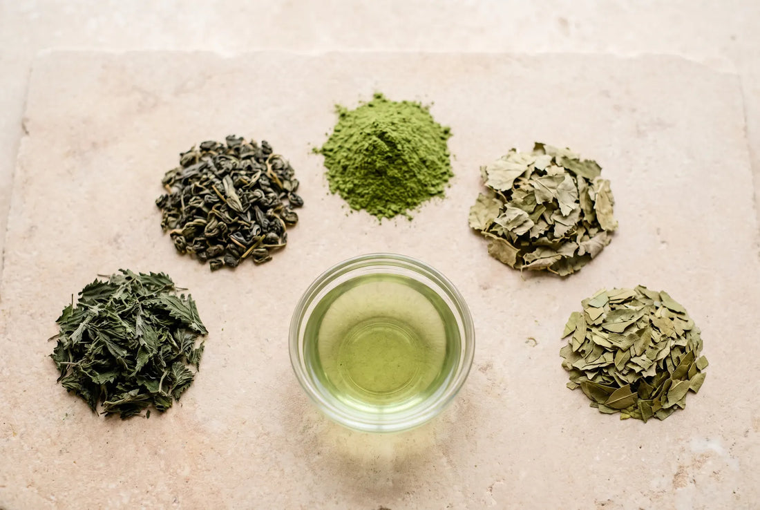 The whole formula. Every plant that goes into the sachet, laid out beside the cup it makes. Nothing else is in there.